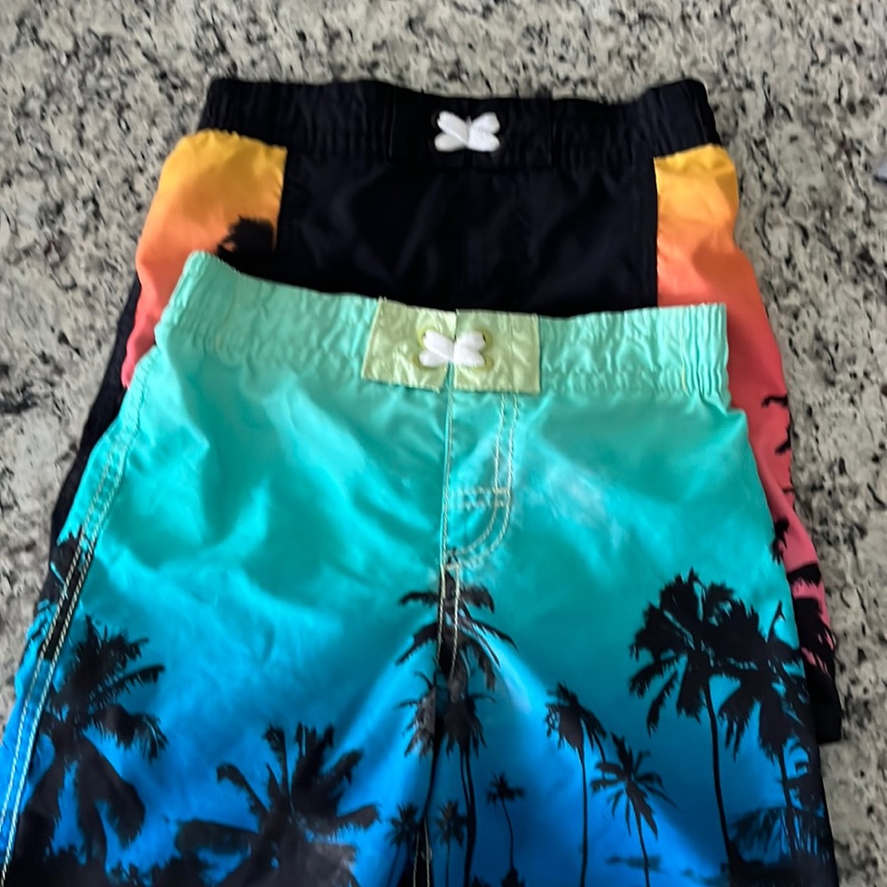 Gently worn- boys size small (6/7) old navy swim trunks- 2 pieces included!
